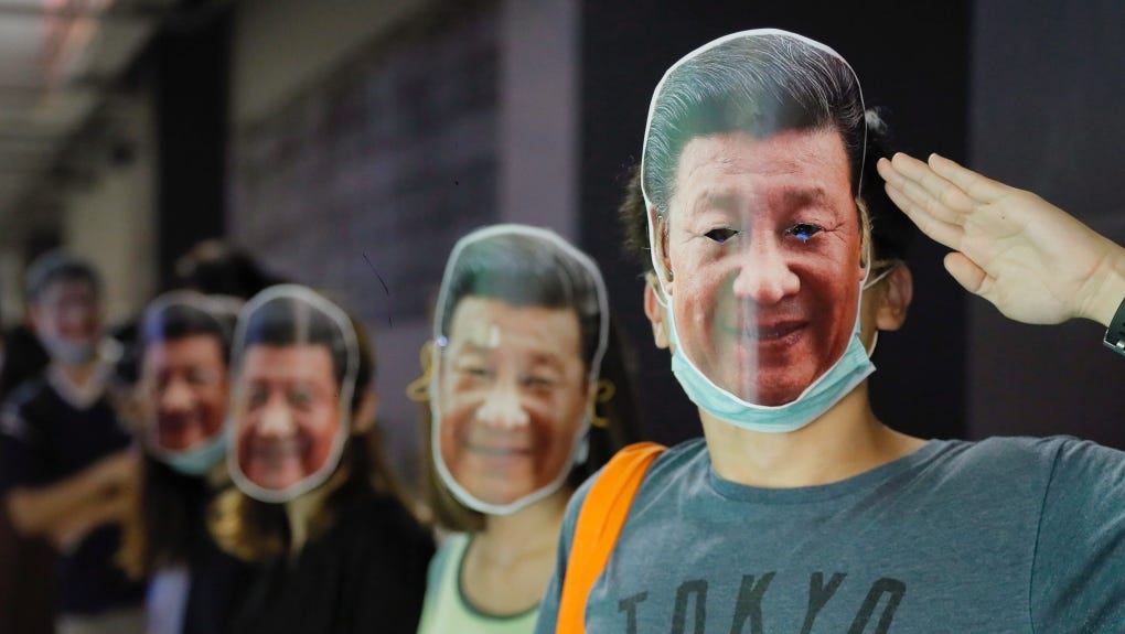 Hong Kong protesters mock China leaders, defy face mask ban | CTV News