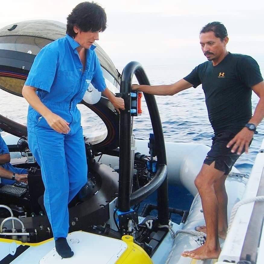 Ghislaine Maxwell coming out of the hatch of her Terramar Project submarine