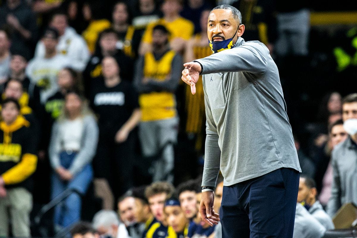 Juwan Howard throws hand video: Michigan head coach involved in fight  following Wisconsin game - DraftKings Nation