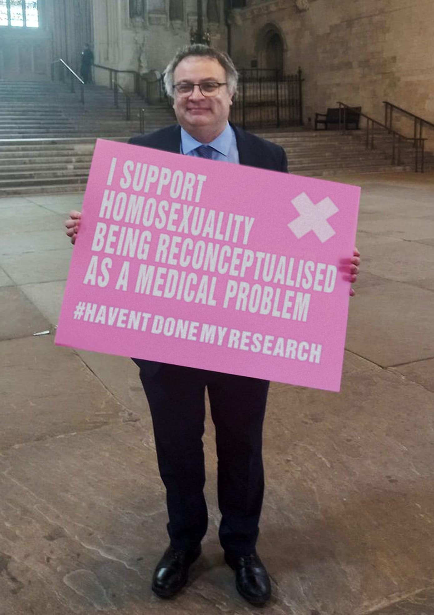 May be an image of 1 person, standing and text that says '|SUPPORT BEING HOMOSEXUALITY AS A MEDICAL RECONCEPTUALISED #HAVENT DONE PROBLEM RESEARCH'