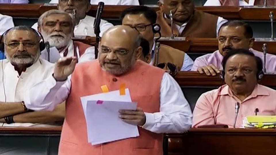 Union Home Minister Amit Shah responds to the debate in the Lok Sabha to revoke Article 370 in LokâSabha on Tuesday. (ANI Photo)