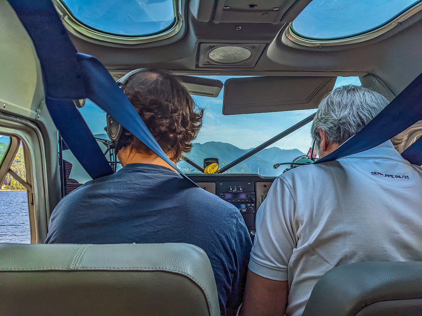 Javier and Lorenzo squeezed togehther in the front of the Cessna. 