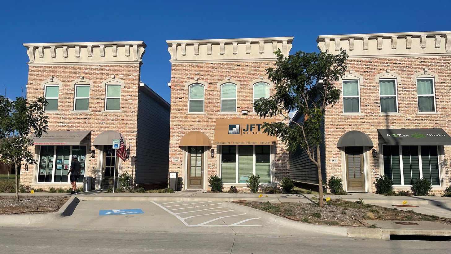 Three live-work units on South Coppell Road, including one branded as Christopher Realty Group
