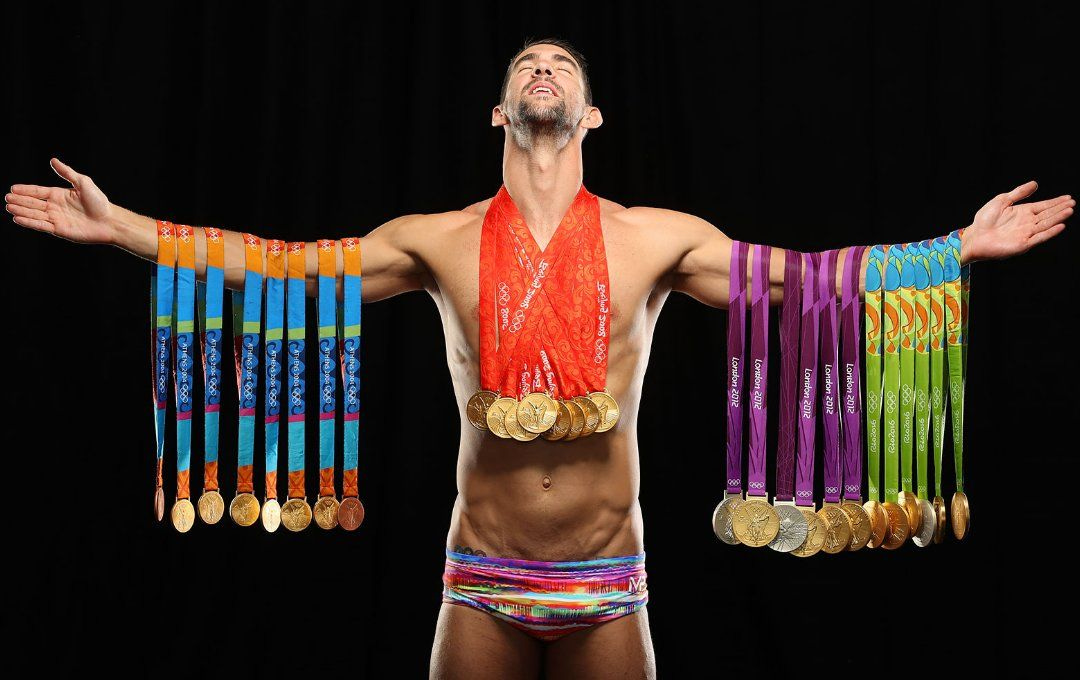 Michael Phelps Poses With All His Gold Medals