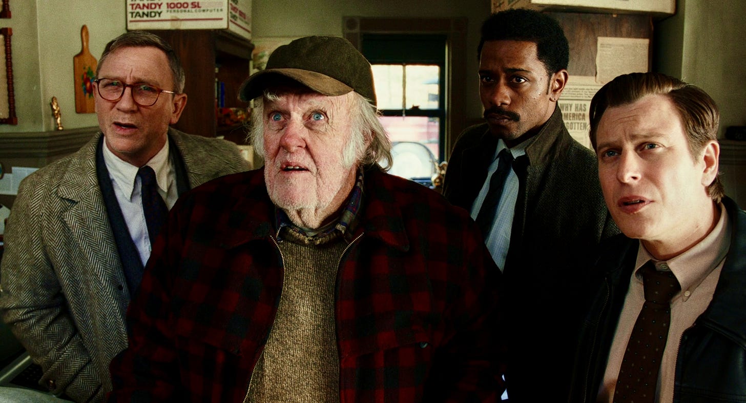 (l-r) Daniel Craig as Benoit Blanc, M. Emmett Walsh as Mr. Proofroc, LaKeith Stanfield as Detective Lieutenant Elliott, and Noah Segan as Trooper Wagner in KNIVES OUT.