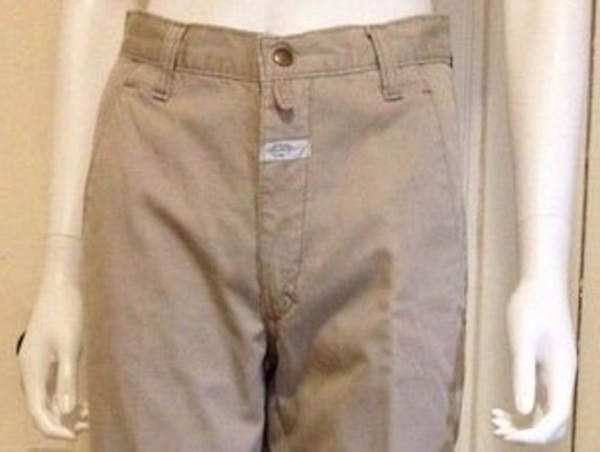 Khaki pants with label on crotch.