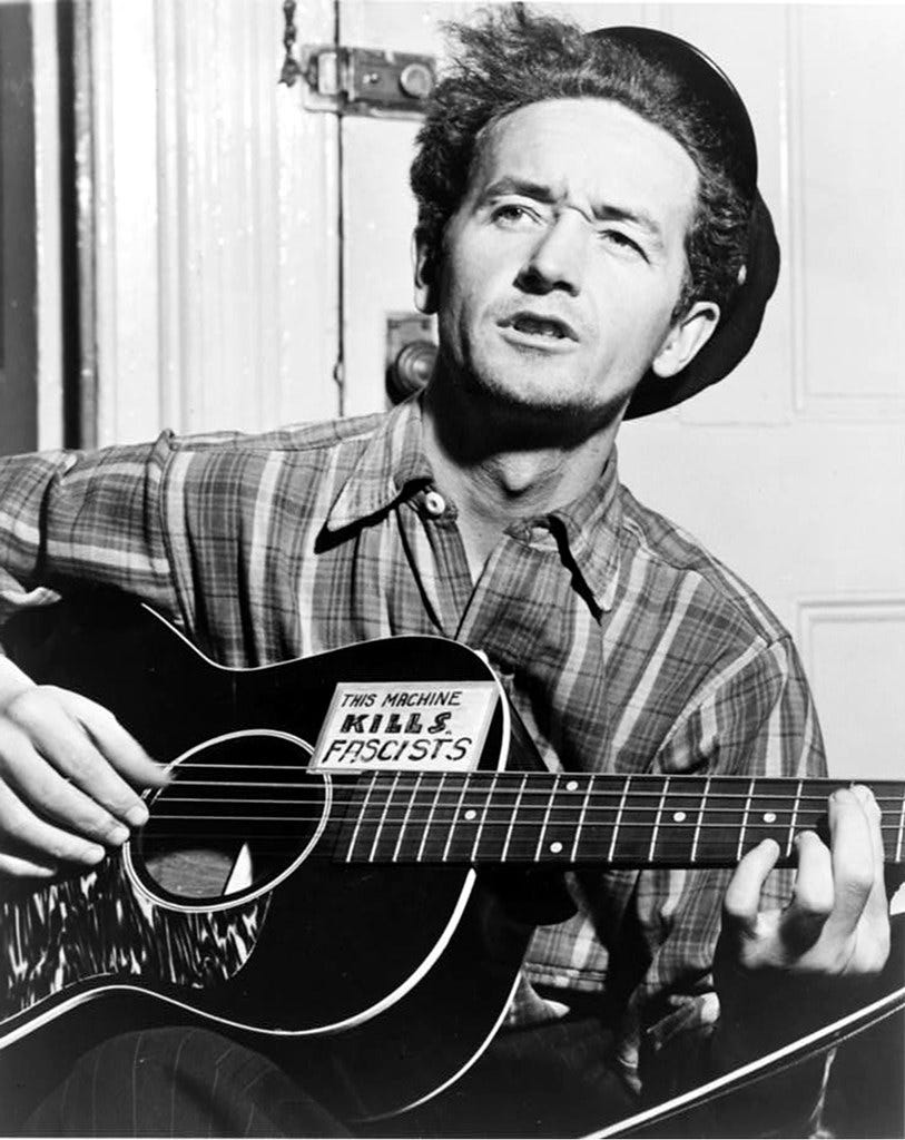 "woody kills fascists - WOODY GUTHRiE" by s76fitz is licensed under CC BY-NC-SA 2.0 