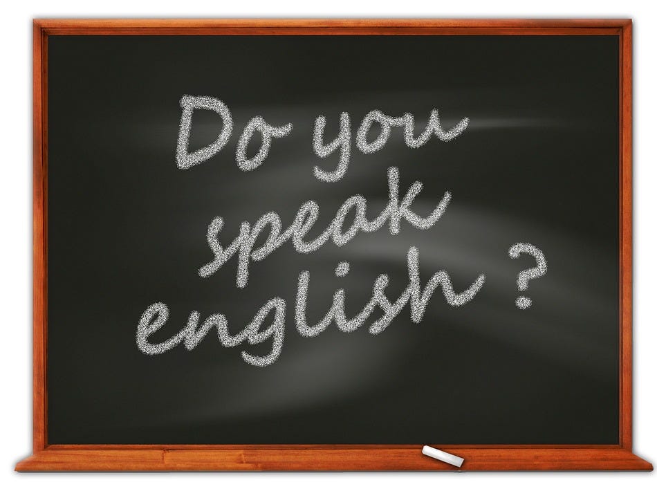 Do you speak English, written on a blackboard