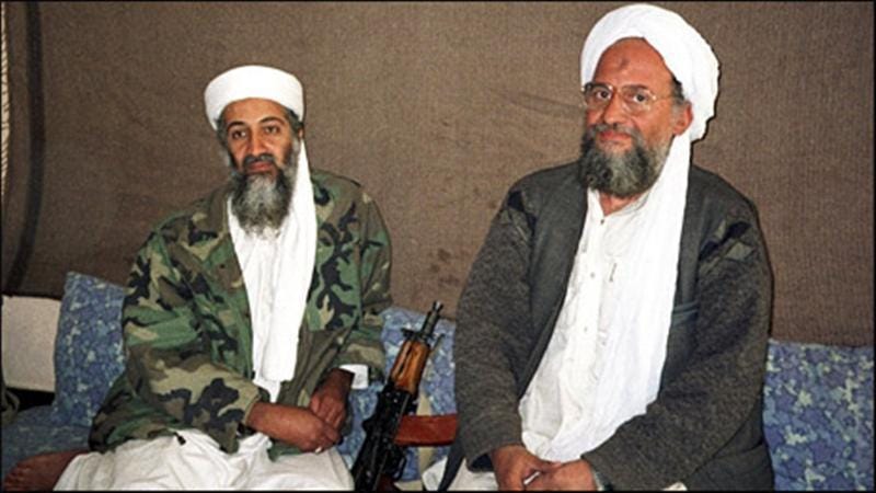 A couple of men wearing white turbans and sitting in chairs

Description automatically generated with low confidence