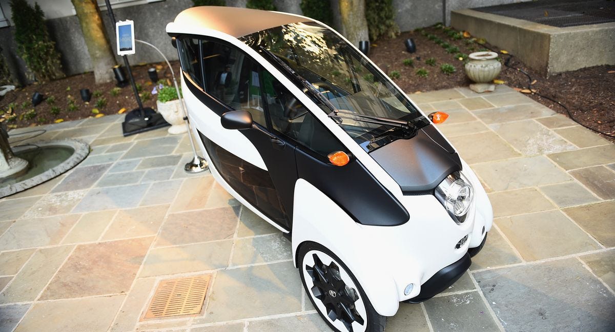 A Toyota i-Road minimobility concept vehicle on display in Washington, D.C.