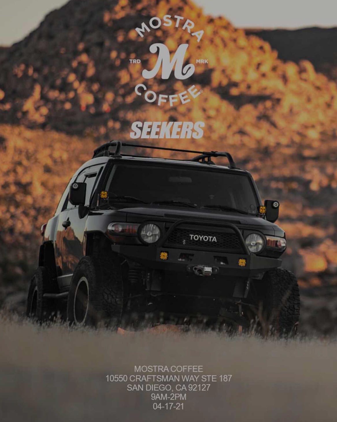 A Toyota SUV in front of a rocky mountain advertising Mostra Coffee's Seekers Coffee and Explore event on April 17th, 2021.