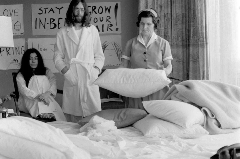 “John & Yoko waiting for the maid to make the bed so they can continue protesting against the system”