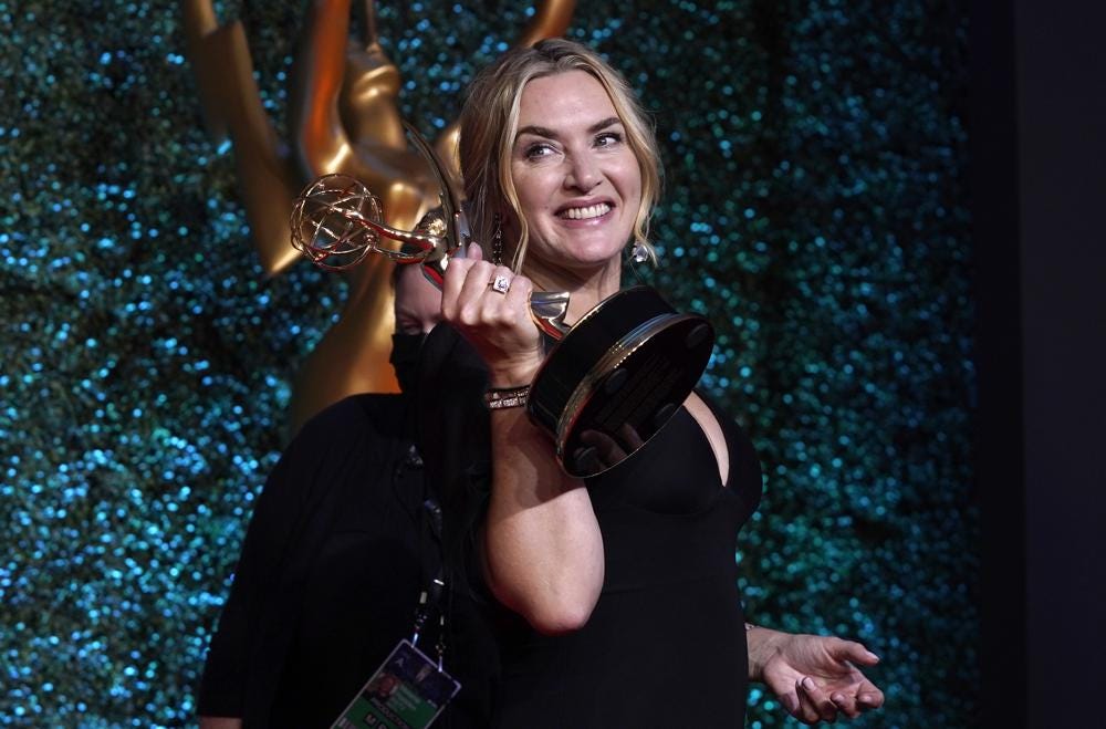 Kate Winslet, winner of the award for outstanding lead actress in a limited or anthology series or movie for "Mare of Easttown" poses at the 73rd Primetime Emmy Awards on Sunday, Sept. 19, 2021, at L.A. Live in Los Angeles. (AP Photo/Chris Pizzello)