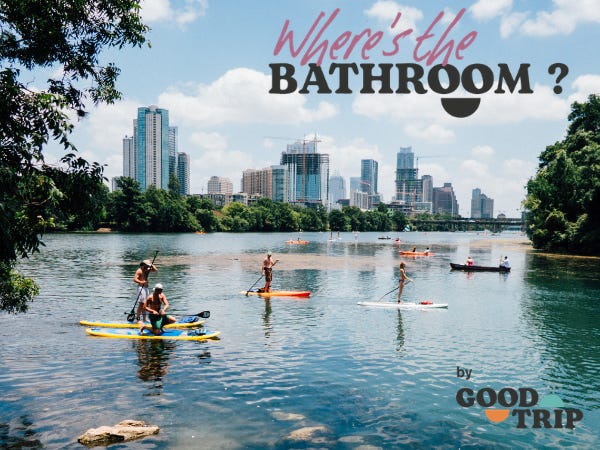 People stand up paddleboarding on a lake in Austin