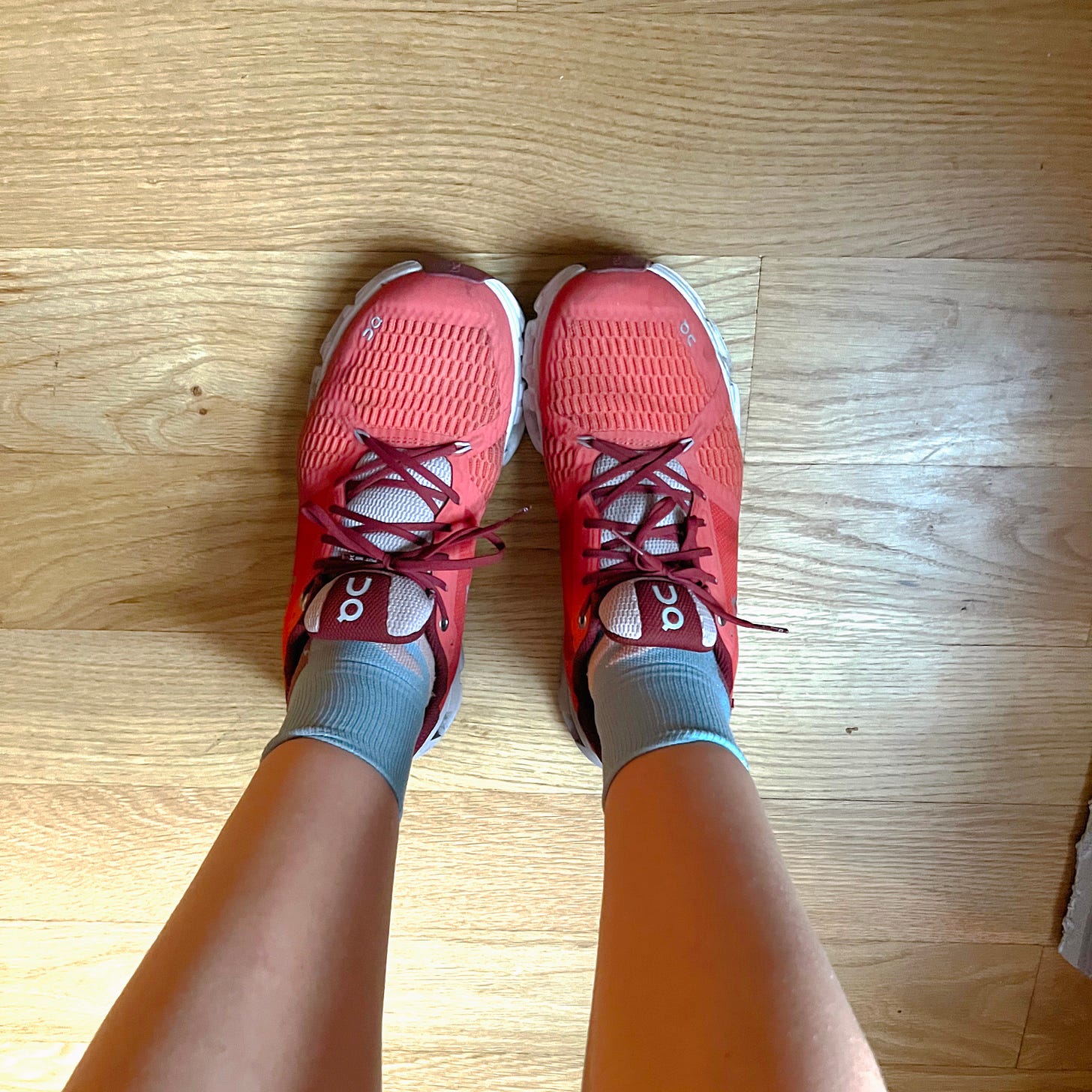 a pair of red running sneakers
