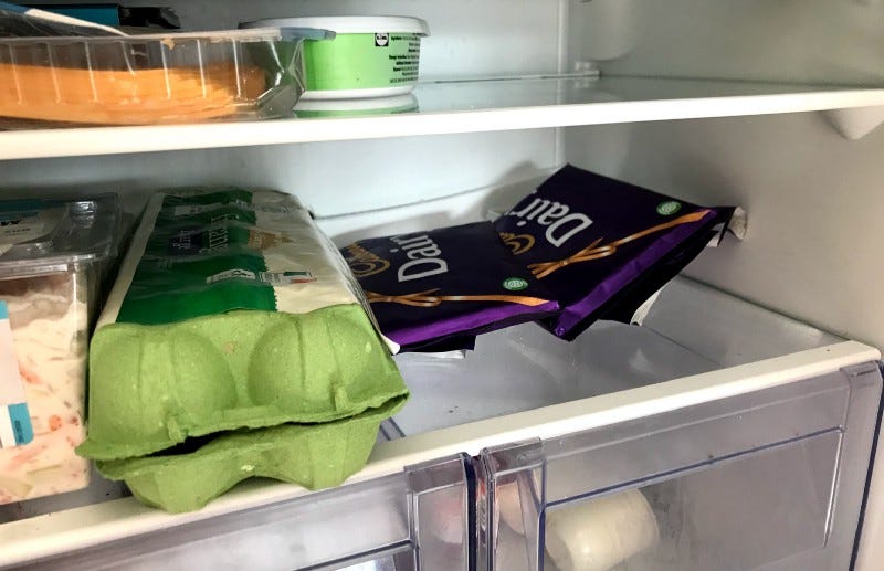 Image of 2 bars of dairy milk inside my fridge