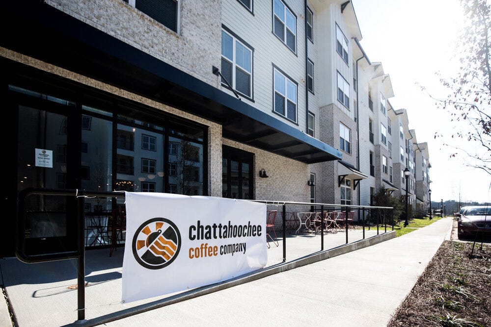 A sign welcome visitors to the newly opened Chattahoochee Coffee Co. at the Eddy