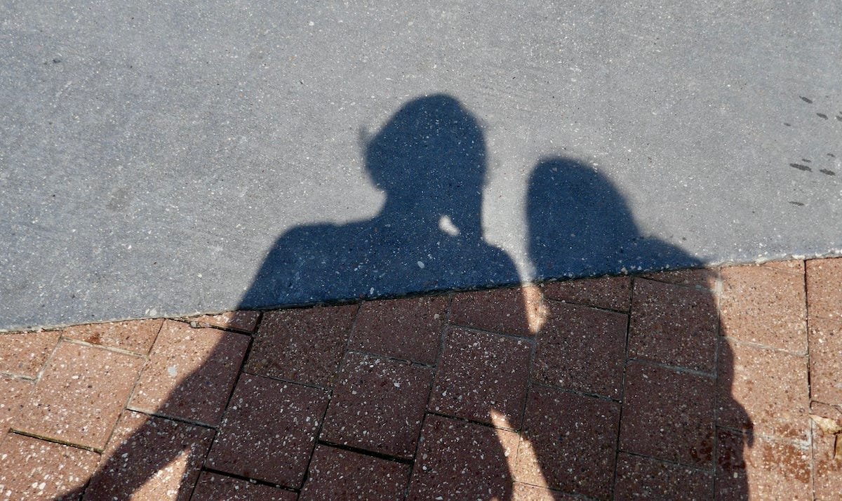 shadow of a mother and child 