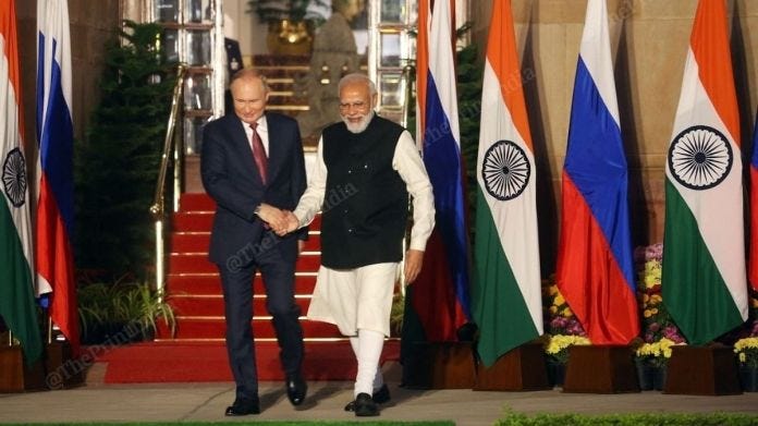 Prime Minister Narendra Modi greets Russian President Vladimir Putin before a meeting at Hyderabad House on 6 December. | Photo: Praveen Jain | ThePrint