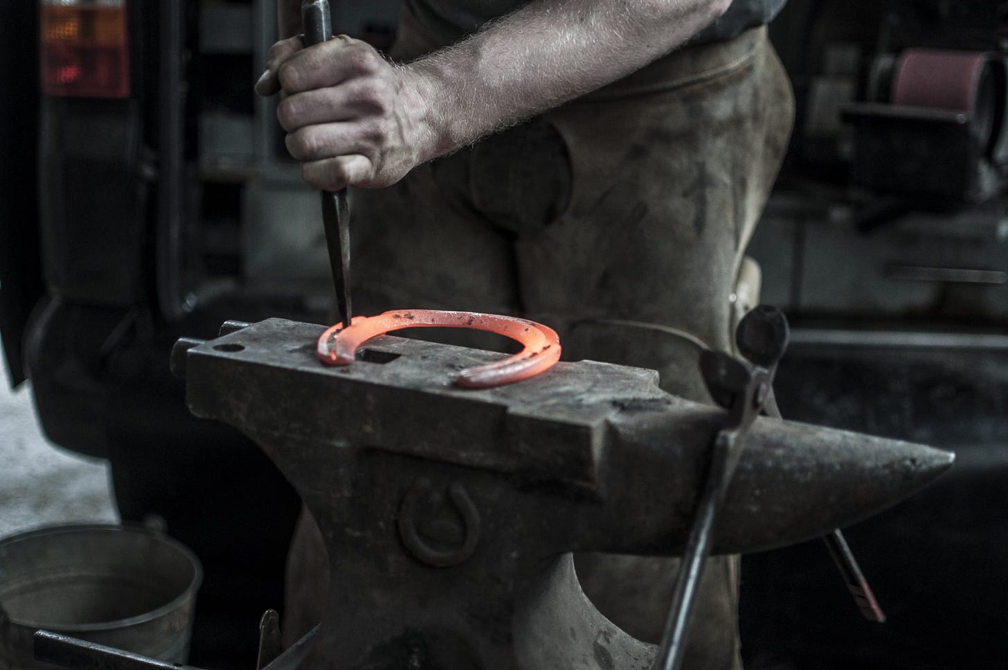 image of a blacksmith working for article titled “go where work is hard”
