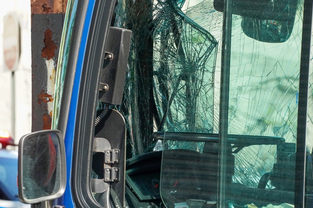 The impact shattered the front windshield of the MTA bus.