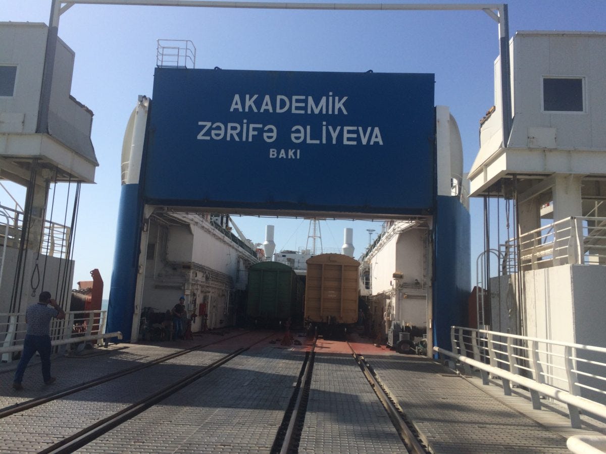 Loaded train wagons are pulled directly on board the ferries. This is one of just 30 rail ferry systems in the world. Image: Wade Shepard.