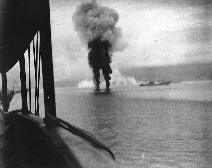 Explosions rock the water as two Japanese planes are shot down during the Naval Battle of Guadalcanal, November 12, 1942