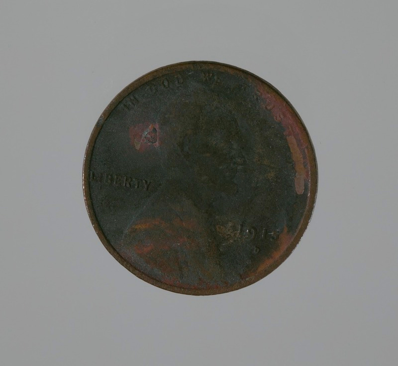 A charred 1915 penny from the 1921 Tulsa Race Massacre, Smithsonian Institution