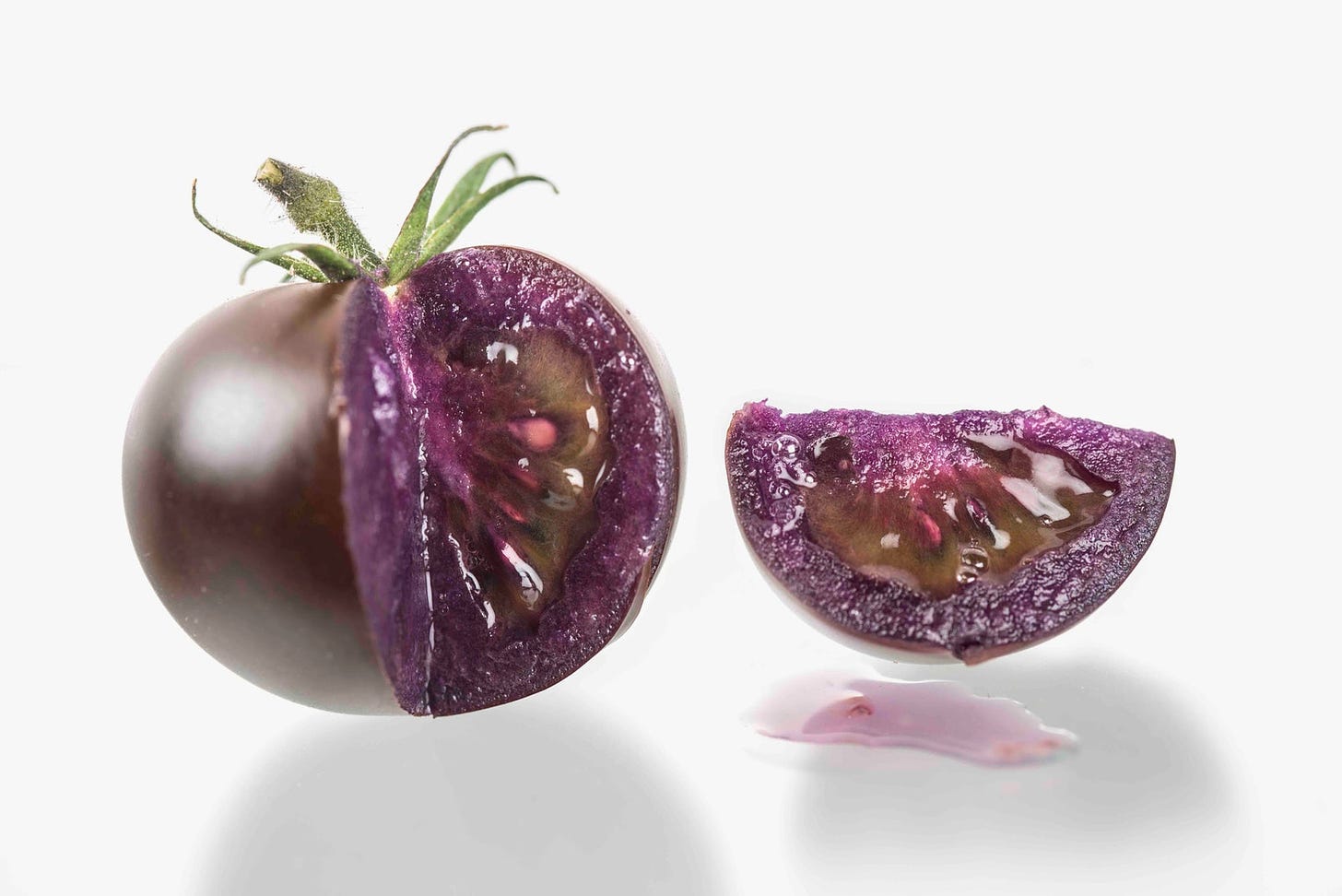 a purple tomato sliced  