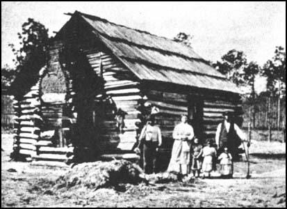 Photograph of slave house with the following caption: "Wooden floors were an unknown luxury. In a single room were huddled, like cattle, ten or a dozen persons, men, women, and children. We had neither bedsteads, nor furniture of any description. Our beds were collections of straw and old rags, thrown down in the corners and boxed in with boards; a single blanket the only covering."