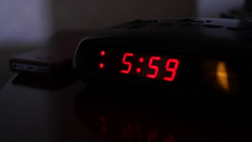 A Digital Alarm Clock Turns Stock Footage Video (100% Royalty-free) 16225447 | Shutterstock