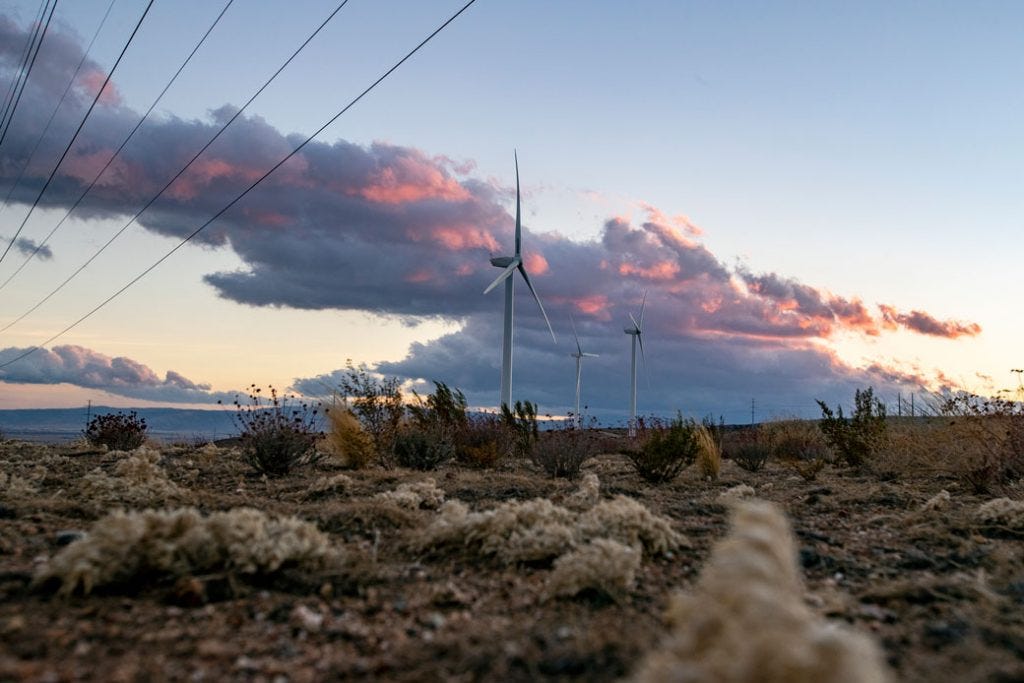 Dusk settles over wind turbines in the Tehachapi Mountains on February 16, 2021, in Rosamond, California.
