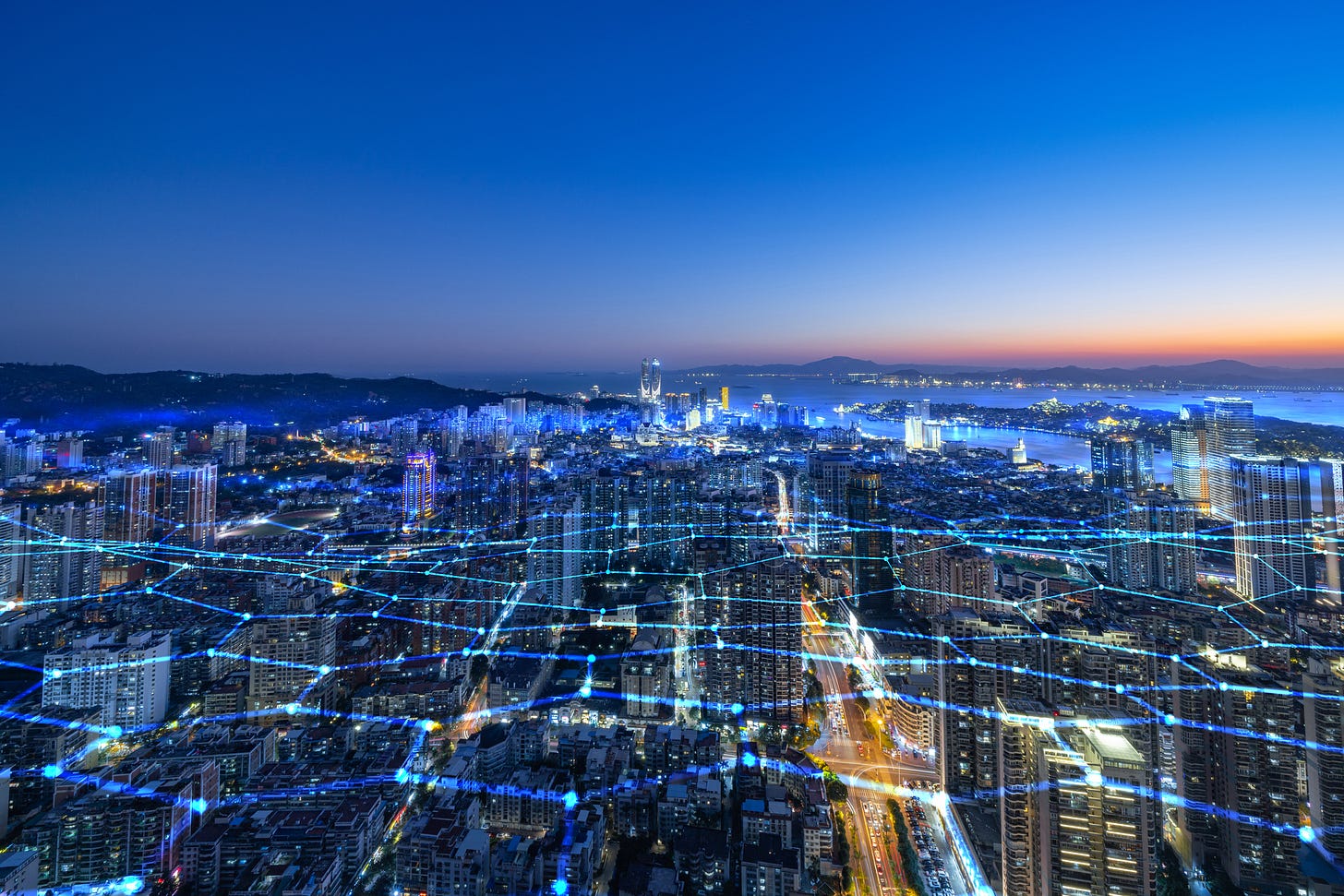 Illustration of a city underneath a honeycomb laser grid. (Getty Images) 