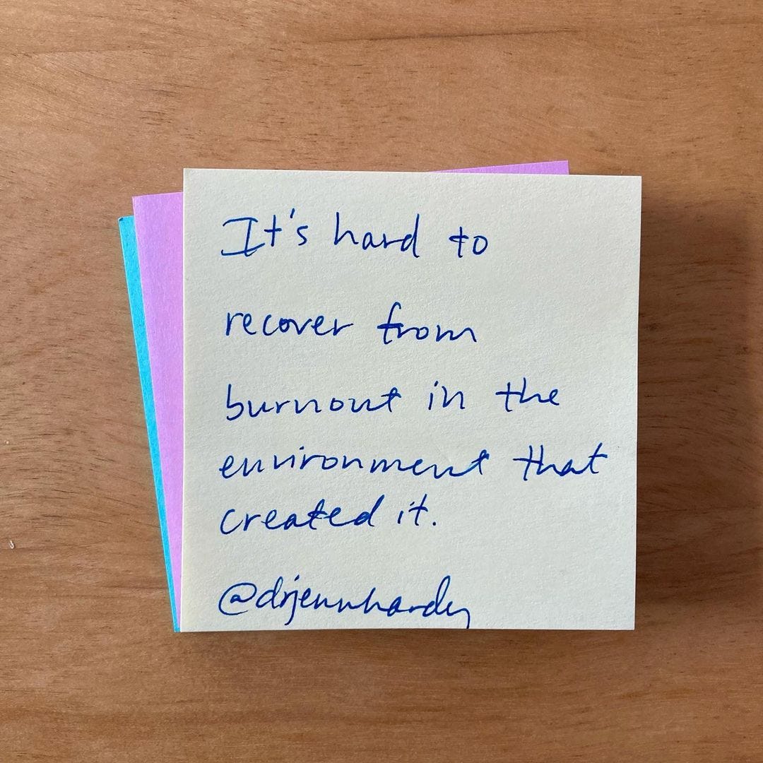 A yellow post-it note with a handwritten quote on it that reads, "It's hard to recover from burnout in the environment that created it" - @drjennhardy