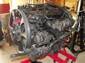 Grungy used Isuzu 4BD1T engine