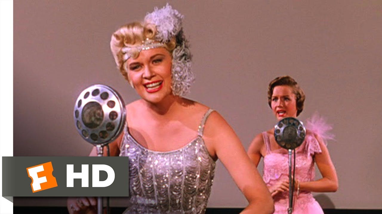 Kathy Selden is revealed to be the real voice behind Lina Lamont in the final scene of "Singin' in the Rain" Kathy Selden is revealed to be the real voice behind Lina Lamont in the final scene of "Singin' in the Rain"