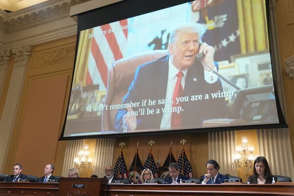 Former President Donald J. Trump appearing on a screen during a hearing of the Jan. 6 committee.