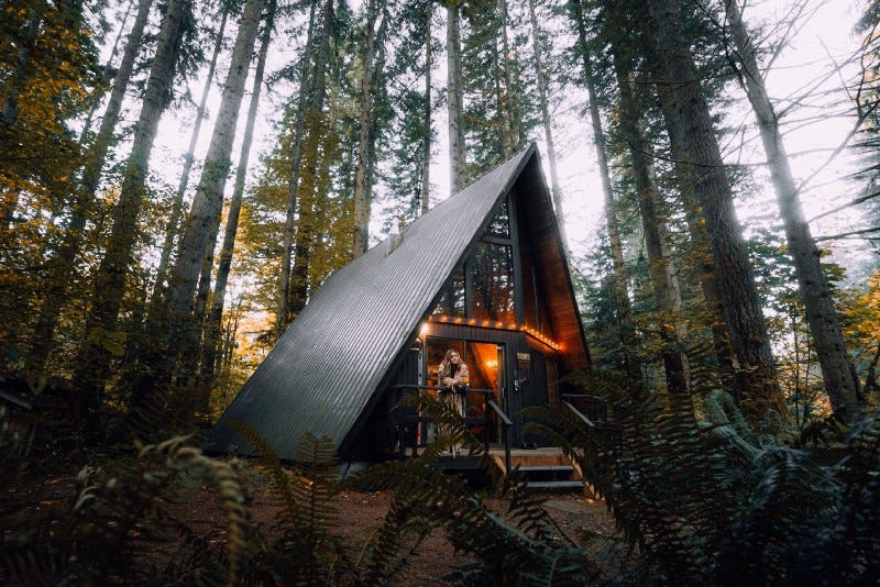 An A-frame cabin in the woods
