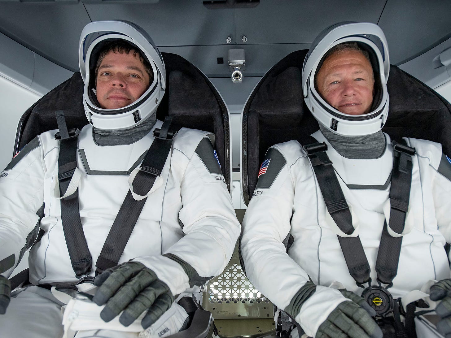 nasa astronauts bob behnken doug hurley spacex spacesuits crew dragon spaceship seats training demo2 demo 2