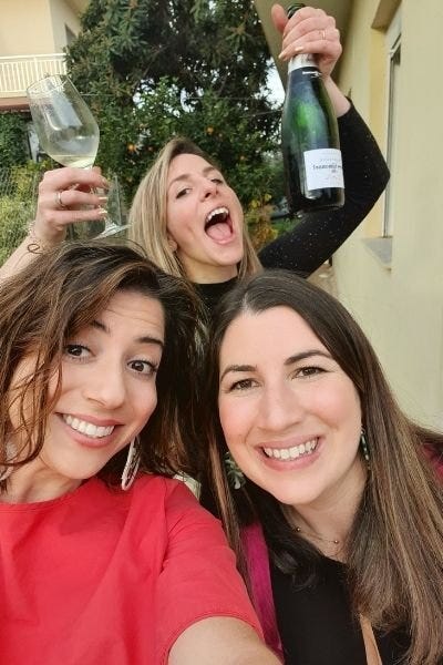 Picture of Anna Maria (bottom right) Alexandra Manousakis (bottom left) and Kleopatra Bright (back), co-founder, on the first official Champagne and French Fries Day on January 10, 2021.