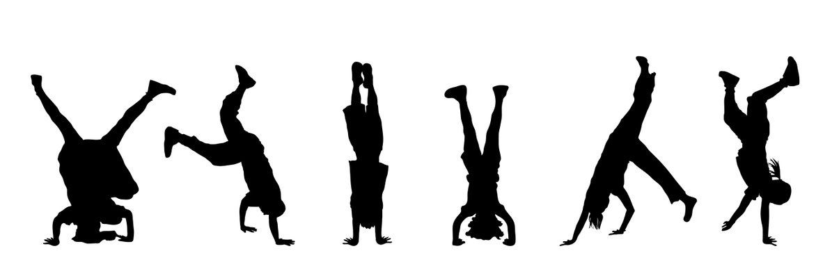 Children doing head stands and hand stands