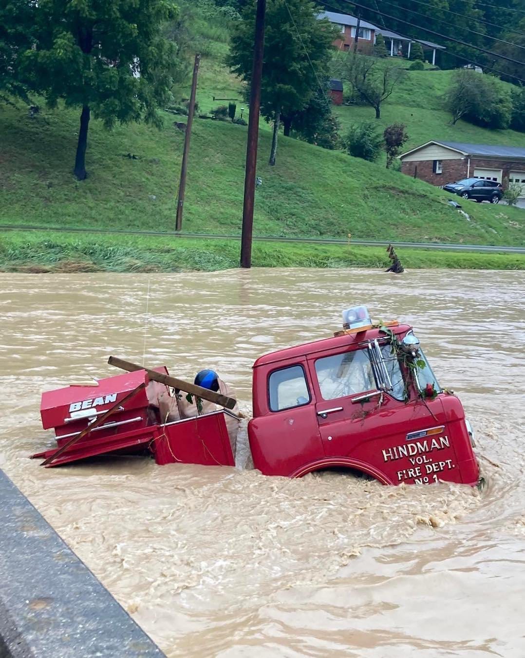 Fire truck trapped in floodwaters