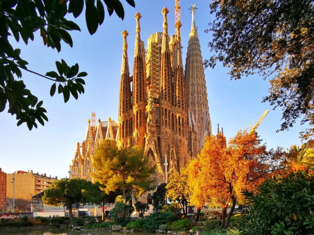 An exterior shot of the Sagrada Familia, a massive cathedral.
