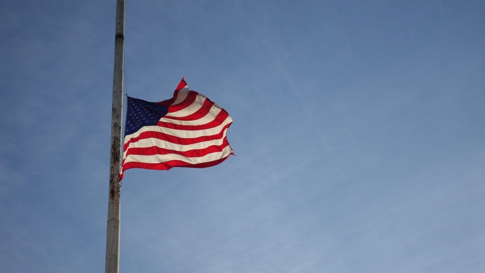 A U.S. flag at half-mast