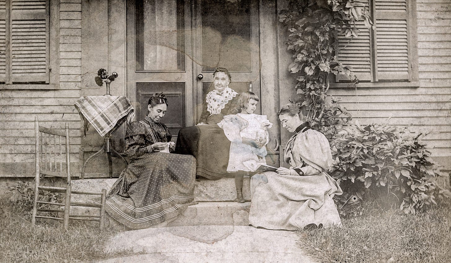 Four women on steps