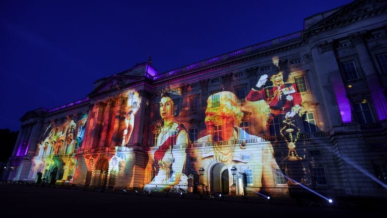 Projections displayed on the front of Buckingham Palace during The Lighting Of The Principal Beacon at Buckingham Palace, London, on day one of the Platinum Jubilee celebrations. Over 3,000 towns, villages and cities throughout the UK, Channel Islands, Isle of Man and UK Overseas Territories, and each of the capital cities of Commonwealth countries are lighting beacons to mark the Jubilee. Picture date: Thursday June 2, 2022.

