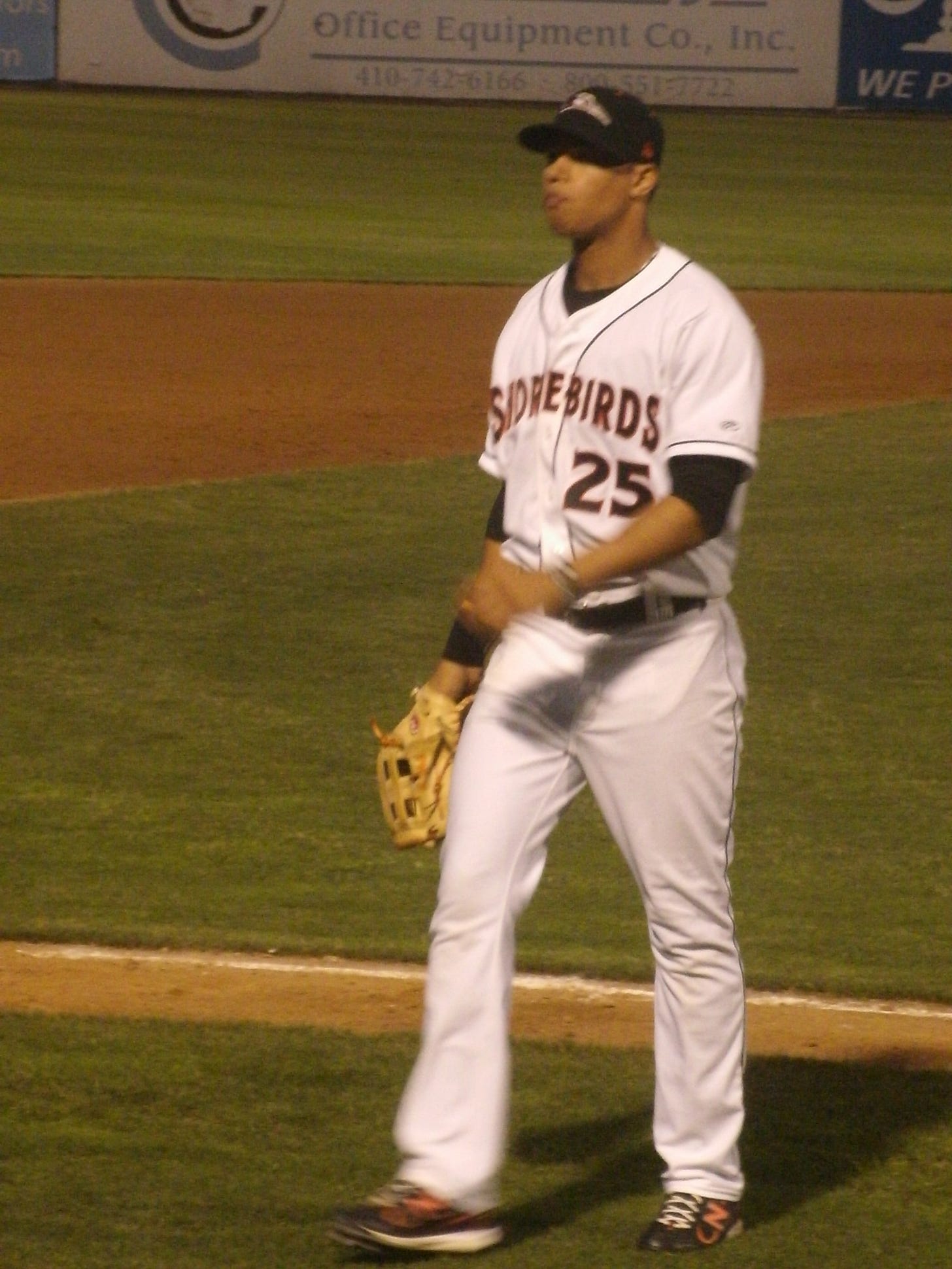 Brendan Webb returns back to the dugout after an inning in right field. That's generally where he's been placed by manager Ryan Minor.