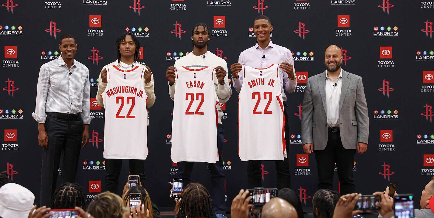Jun 24, 2022; Houston, Texas, USA; Houston Rockets head coach Stephen Silas and first round draft picks TyTy Washington Jr. and Tari Eason and Jabari Smith Jr. and Houston Rockets general manager Rafael Stone pose for a picture during a press conference at Toyota Center. Mandatory Credit: Troy Taormina-USA TODAY Sports