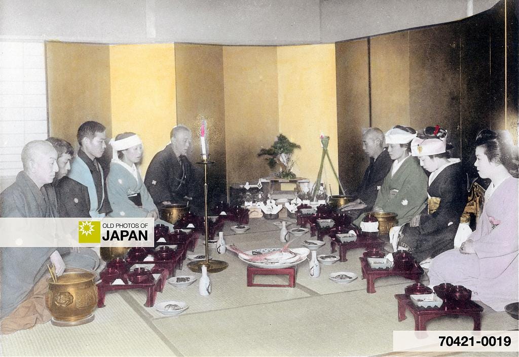 A Japanese family enjoys a wedding dinner at home, 1905