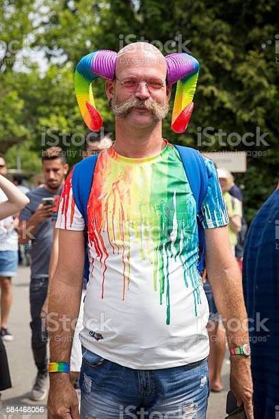 Man With Rainbow Ram Horns Pink Saturday 2016 Gay Europride Stock Photo -  Download Image Now - iStock